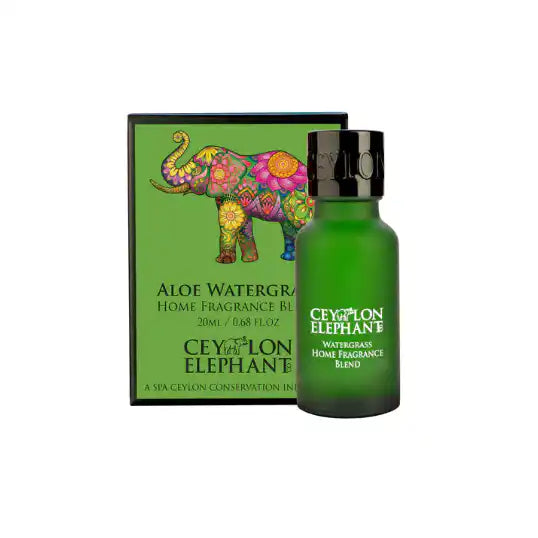 Aloe Watergrass home fragrance blend in green bottle with colorful elephant box