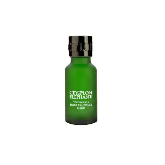 Green glass bottle of Ceylon Elephant Watergrass home fragrance blend
