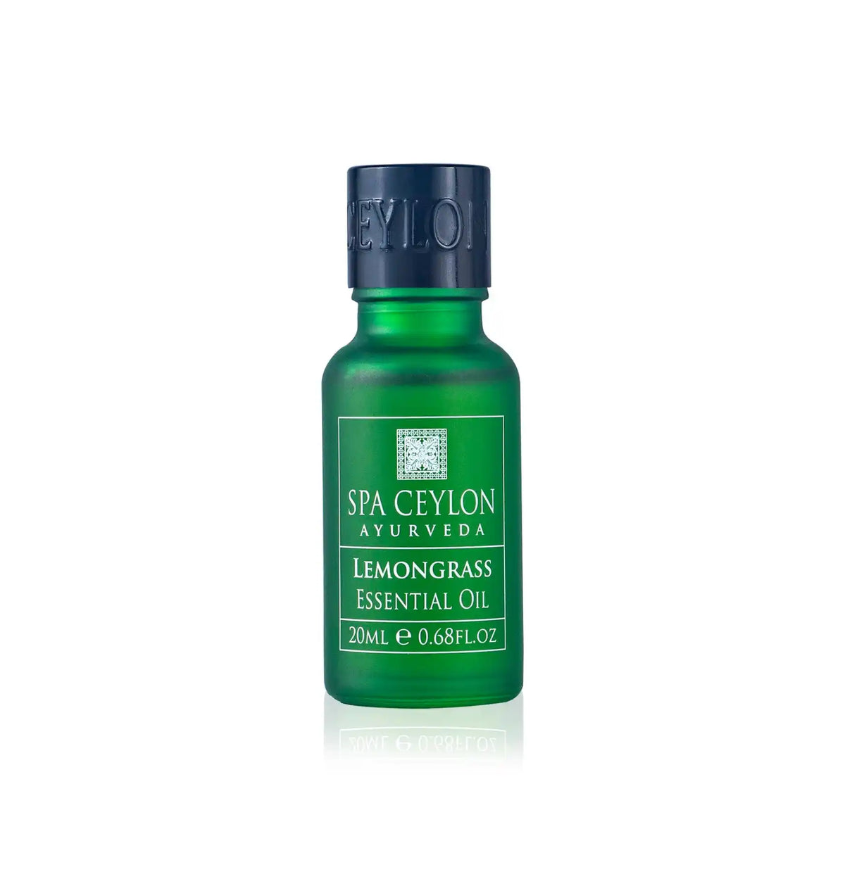 Green glass bottle of lemongrass essential oil with black cap on white background